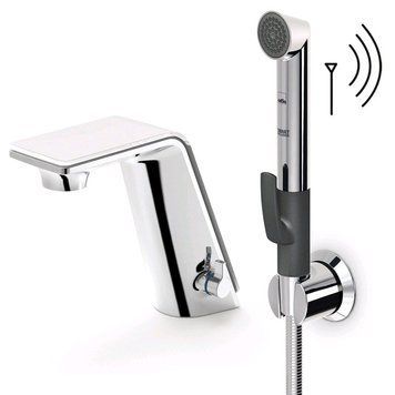 Смеситель для умывальника Oras Alessi 8712F электронный питание от батарейки с гигиеническим душем (хром) 131211 фото
